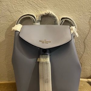 Brand new Kate Spade mini backpack - original packaging and tag still attached.